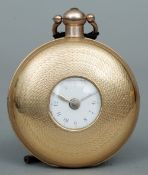 An early 19th century 18 ct gold half hunter pocket watch
The engine turned case enclosing the white