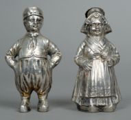 A pair of Dutch silver pepper pots
One formed as a young boy, the other a young girl, each in