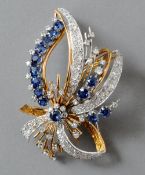 A fine quality 1950s sapphire and diamond spray brooch
Set in 18 ct gold with approximately 4.5