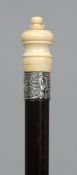 A George V silver mounted ivory topped malacca walking stick
With an inscribed silver collar;