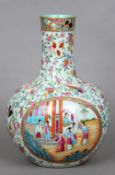 A 19th century Cantonese porcelain baluster vase
The elongated neck decorated with birds and insects