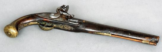 An 18th/19th century flintlock pistol
The long barrel engraved and heightened with gilt decoration.