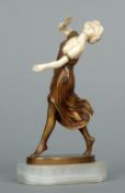 An Art Deco bronze and ivory girl figurine
Modelled as a scantily clad dancing lady, the base