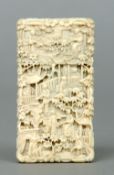 A small 19th century Cantonese carved ivory card case
Decorated allover with figures and pagodas