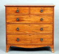 A 19th century mahogany chest of drawers
The rectangular top above an arrangement of two short and
