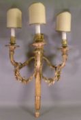 A set of four 19th century style ormolu three branch wall lights
The main body formed as an arrow