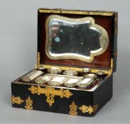 A 19th century French silver gilt mounted travelling vanity set
The gilt metal mounted ebony case
