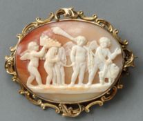 A 19th century unmarked yellow metal framed cameo brooch
Carved to the front with cherubs, in a