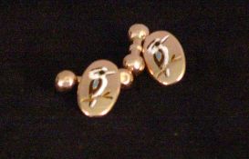 A pair of 9 ct gold and enamelled cufflinks
Each decorated with a kookaburra, in fitted case for F.