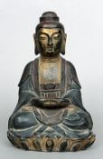 A 19th century painted and patinated cast bronze figure of Buddha
Typically modelled in the lotus