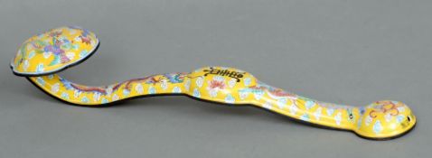 A Chinese cloisonne ruyi sceptre
Decorated with birds, bats and dragons amongst clouds.  35 cms