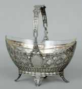 A late 19th/early 20th century German unmarked silver basket
With a loop handle and pierced body