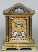 A 19th century cloisonne decorated bronze mantel clock
Of architectural form with twin Corinthian