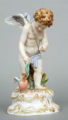 A 19th century Meissen porcelain figure
Formed as a cherub leading a flaming flying heart,