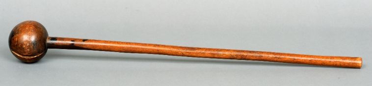 A 19th century African tribal knobkerrie
The plain shaft with a ball finial.  70 cms long.