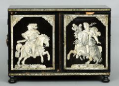 A Milanese ivory inlaid ebony table cabinet
The twin doors inlaid with classical figures astride