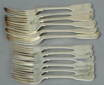 Six Victorian silver Fiddle pattern table forks and six dessert forks, hallmarked London 1917,