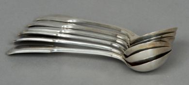 A set of six George V Fiddle and Thread pattern silver sauce ladles, each hallmarked Sheffield 1912,