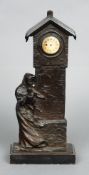 An early 20th century Art Nouveau Austrian patinated bronze clock
Formed as a woman beside a clock