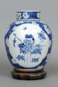 A 19th century Chinese blue and white ginger jar and cover
The ovoid body decorated with panels of