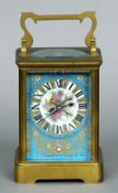 A 19th century brass cased carriage clock
Mounted with painted porcelain panels, each depicting