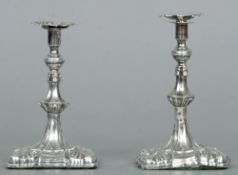 A pair of Edwardian silver candlesticks, hallmarked Birmingham 1901, maker's mark of M & Co.
Each