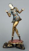 An Art Deco style cold painted bronze and ivory figurine
Formed standing astride an elephant mounted