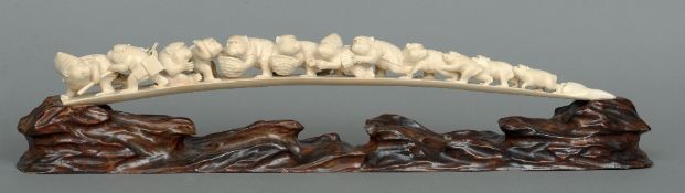 A 19th century Oriental ivory tusk carving
Carved from a single tusk as a family of apes, some