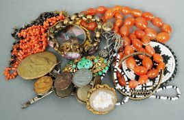 A quantity of various jewellery
Including: cameo brooches, coral necklaces, rings, brooches and