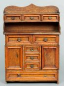 A 19th century Continental miniature oak dresser
Probably an apprentice piece, modelled with an