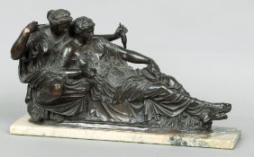 A 19th century bronze figural group
Formed as a pair of lovers reclining in classical attire, the