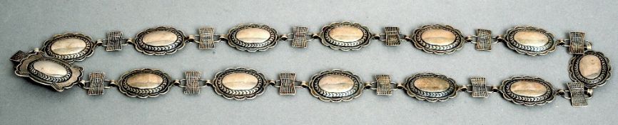 An American unmarked silver Navaho concho belt
83 cms long.   CONDITION REPORTS:  Some tarnishing