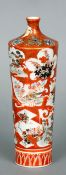 A Japanese Kutani vase
Of slender form and typically decorated, red painted marks to base.  24 cms