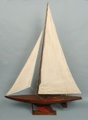 An early 20th century pond yacht
Typically modelled with brass fitments and full rigging, on a later