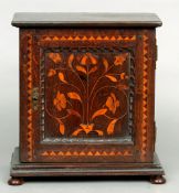 A 17th/18th century oak spice cabinet
The rectangular top above the florally marquetry inlaid