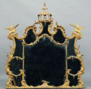A 19th century carved giltwood chinoiserie mirror, in the manner of Thomas Chippendale
The