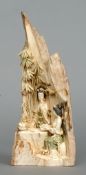 A Chinese ivory tusk carving, possibly mammoth
Formed as two female figures in a cave, one reading