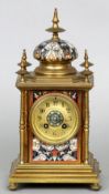 A 19th century cloisonne decorated bronze mantel clock
The domed finial mounted top above the