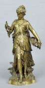 A large 19th century bronze figurine entitled La Vendange
Formed as a classically dressed maiden