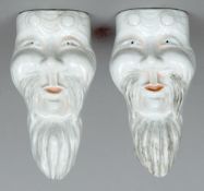 A pair of 19th century Japanese wall pockets
Each formed as the head of a bearded gentleman.  17 cms