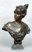 A 19th century bronze bust, Lucrece
The female figure wearing a tiara, signed E. Villanis, the