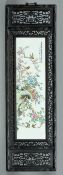 A Chinese painted porcelain panel 
Decorated with various birds amongst foliage and calligraphy,