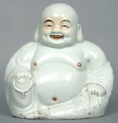 A 19th century Chinese blanc de chine model of Buddha
Typically formed and holding a bead