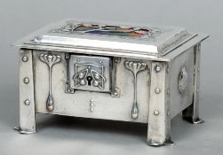 An Art Nouveau enamel decorated silver plated casket
The hinged rectangular lid centred with a