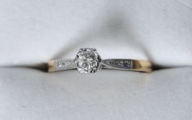 An 18 ct gold diamond solitaire ring
Set in platinum shoulders.   CONDITION REPORTS:  Generally in