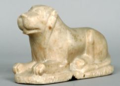 An Eastern carved alabaster model of a large cat
Modelled seated on a plinth base.  26 cms wide.