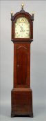 A George III oak eight day longcase clock The gilt ball finial mounted hood enclosing the painted