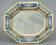 A 19th century Venetian pietra dura framed mirror The octagonal frame variously decorated with