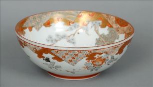 A late 19th century Japanese Kutani bowl With typical gilt and iron red decoration, the centre