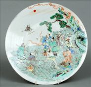 An 18th/19th century Chinese plate Decorated with figures before a deity riding a crane, possibly